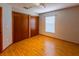 Inviting bedroom with closet and laminate flooring, offering space for relaxation at 3267 Villa Way Cir, St Cloud, FL 34769