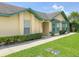 Charming single-story home featuring a well-maintained lawn and inviting facade at 3267 Villa Way Cir, St Cloud, FL 34769
