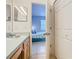 Bathroom view into an adjoining bedroom at 341 Whittier St, Davenport, FL 33896