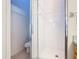 Bathroom with glass shower showcasing white tiling at 341 Whittier St, Davenport, FL 33896