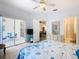 A bright bedroom that includes access to the lanai and bathroom at 341 Whittier St, Davenport, FL 33896