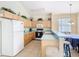 Functional kitchen equipped with appliances, ample counter space, and cabinetry at 341 Whittier St, Davenport, FL 33896