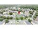 Neighborhood aerial shot of properties with screened-in pools, showcasing a Gathering-friendly community at 350 Scrub Jay Way, Davenport, FL 33896