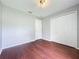 This bedroom has nice wood floors and a double door closet for ample storage at 350 Scrub Jay Way, Davenport, FL 33896