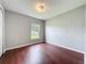 Bedroom with hardwood floors and bright natural light at 350 Scrub Jay Way, Davenport, FL 33896