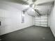 This garage has a ceiling fan, and an electric garage door at 350 Scrub Jay Way, Davenport, FL 33896