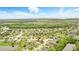 Drone shot of neighborhood showcasing the location and the surrounding natural beauty at 3859 Spirited Cir, St Cloud, FL 34772