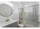 Updated bathroom with new fixtures and glass shower door at 3859 Spirited Cir, St Cloud, FL 34772