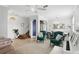 Bright living space seamlessly connects to a dining area, featuring stylish furnishings and decor at 3859 Spirited Cir, St Cloud, FL 34772