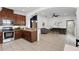 Open living area with stainless steel appliances and a seamless transition to the living room at 3859 Spirited Cir, St Cloud, FL 34772