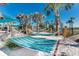 Serene hammock area with striped hammocks between palm trees, perfect for relaxation and leisure at 3878 Lana Ave, Davenport, FL 33897