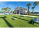Outdoor recreation area with cornhole boards and seating, great for social gatherings and fun activities at 3878 Lana Ave, Davenport, FL 33897