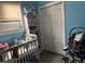 Bedroom with a crib and ample space at 419 Ohio Ave, St Cloud, FL 34769