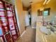 Bathroom with double sinks, tile floors, shower with a curtain, and neutral paint color at 4368 Fox Glen Loop, Kissimmee, FL 34746