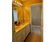 Bathroom with double sinks, tile floors and neutral paint color at 4368 Fox Glen Loop, Kissimmee, FL 34746