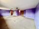 Large bonus room with dual ceiling fans, plush carpeting, and plenty of space for activities at 4368 Fox Glen Loop, Kissimmee, FL 34746