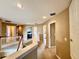 Upstairs hallway with carpet and views of the rooms at 4368 Fox Glen Loop, Kissimmee, FL 34746