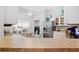Bright kitchen featuring a breakfast nook and modern appliances at 516 Millifiora Ln, Kissimmee, FL 34759