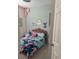 A charming bedroom with colorful bedding and playful decor, perfect for a  at 522 Feltrim Manor Rd, Haines City, FL 33844