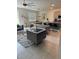 Open-concept living area with modern decor, flowing into the dining and kitchen spaces at 522 Feltrim Manor Rd, Haines City, FL 33844