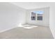 Bright bedroom with neutral walls and plush carpeting, enhanced by ample natural light at 530 Summit River Dr, Apopka, FL 32712