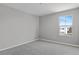 Neutral bedroom with carpet flooring and a window that allows natural light at 540 Summit River Dr, Apopka, FL 32712