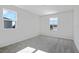 Bright bedroom featuring soft carpeting, neutral walls, and multiple windows offering great outdoor views at 545 Summit River Dr, Apopka, FL 32712