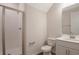 Clean bathroom with a glass-enclosed shower, white vanity, and modern fixtures at 565 Summit River Dr, Apopka, FL 32712