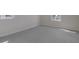 Carpeted bedroom featuring base molding, two windows, and electrical outlets at 565 Summit River Dr, Apopka, FL 32712