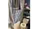 Bathroom boasts navy blue accent wall, gold fixtures, and tub with shower at 5930 Tivoli Gardens Blvd, Orlando, FL 32829