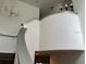 Foyer with chandelier and stylish silver trim, leading to the home's upper level at 5930 Tivoli Gardens Blvd, Orlando, FL 32829