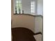 Bright hallway with modern decor and two black frame windows at 5930 Tivoli Gardens Blvd, Orlando, FL 32829