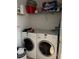 Convenient laundry room featuring a front-load washer and dryer at 5930 Tivoli Gardens Blvd, Orlando, FL 32829