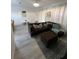 Bright living room with modern flooring, comfortable seating, and stylish decor at 615 Terra Lago St, Davenport, FL 33897