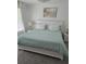 Inviting main bedroom with soft lighting, neutral tones, and comfortable furnishings at 615 Terra Lago St, Davenport, FL 33897