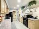 Efficient kitchen with ample storage and modern appliances at 624 Royal Palm Dr, Kissimmee, FL 34743