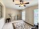 Bright living room featuring tile floors, neutral color scheme, and decorative accents, creating a welcoming atmosphere at 624 Royal Palm Dr, Kissimmee, FL 34743