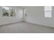 Spacious bedroom with tile floors and ample natural light at 630 Summit River Dr, Apopka, FL 32712