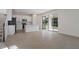 Open-concept kitchen with stainless steel appliances and a sliding glass door at 630 Summit River Dr, Apopka, FL 32712