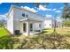 Backyard with covered patio at 645 Summit River Dr, Apopka, FL 32712