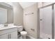 Clean bathroom with glass shower, modern fixtures, and white vanity at 645 Summit River Dr, Apopka, FL 32712