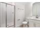 Clean bathroom featuring a glass-enclosed shower, modern vanity, and neutral decor for a fresh look at 655 Summit River Dr, Apopka, FL 32712