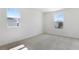 Comfortable bedroom with plush carpeting, large windows, and natural light at 655 Summit River Dr, Apopka, FL 32712