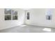 Sunlit bedroom with light hardwood floors and multiple windows, offering serene views and natural light at 655 Summit River Dr, Apopka, FL 32712