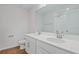 Elegant bathroom with double sinks, stylish fixtures, spacious countertops, and a large mirror at 660 Summit River Dr, Apopka, FL 32712