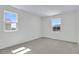 Bright, carpeted bedroom with plenty of natural light at 665 Summit River Dr, Apopka, FL 32712