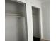 Empty closet space with shelving, ready to organize belongings at 731 Michigan Ct # 1, St Cloud, FL 34769
