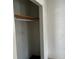 Empty closet with rod, showcasing the space for storage and organization at 731 Michigan Ct # 1, St Cloud, FL 34769
