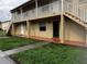Property exterior featuring multiple units with a well-maintained lawn at 731 Michigan Ct # 1, St Cloud, FL 34769
