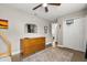 This cozy bedroom features hardwood floors, a dresser and a basketball hoop on the closet door at 736 Forest Glen Ct, Maitland, FL 32751